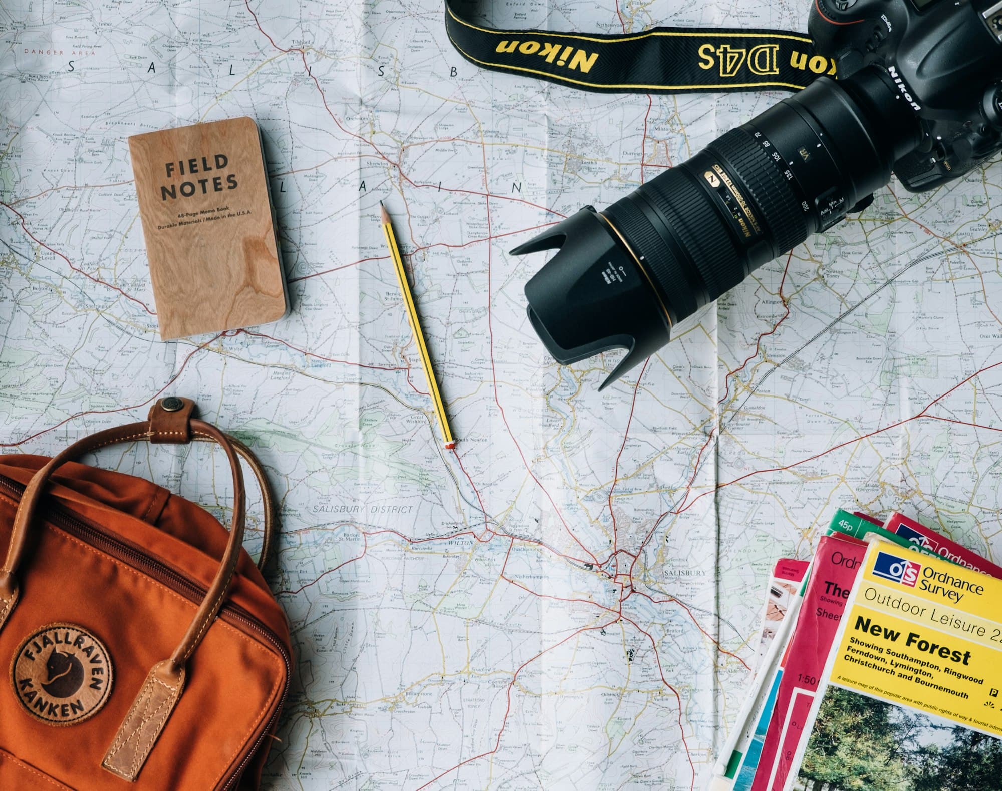 Traveler planning a journey with a map